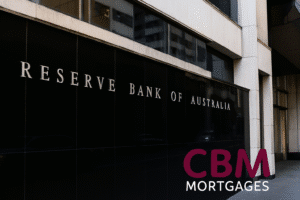 Exterior of the Reserve Bank of Australia building with CBM Mortgages logo overlay, symbolising the August 2025 cash rate cut.